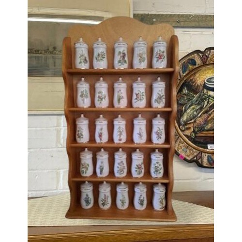 591 - The fairy flower spice jars (approx. 30) together with display rack