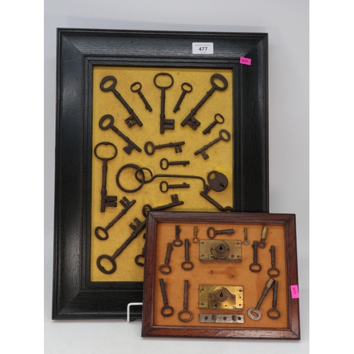 477 - Three framed displays of antique and later keys