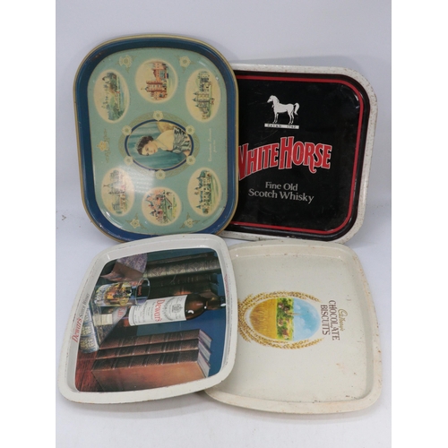 516 - A quantity of vintage and later tin trays to include Whitbread, Teachers, Whitehorse etc