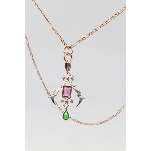 282A - 9ct gold fine chain with nouveau shaped drop pendant set with pink stone and seed pearls