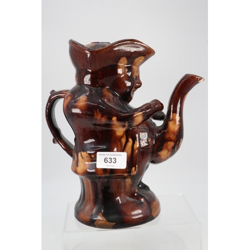 633 - A 19th Century treacle glazed Toby teapot (approx. 24cm tall)