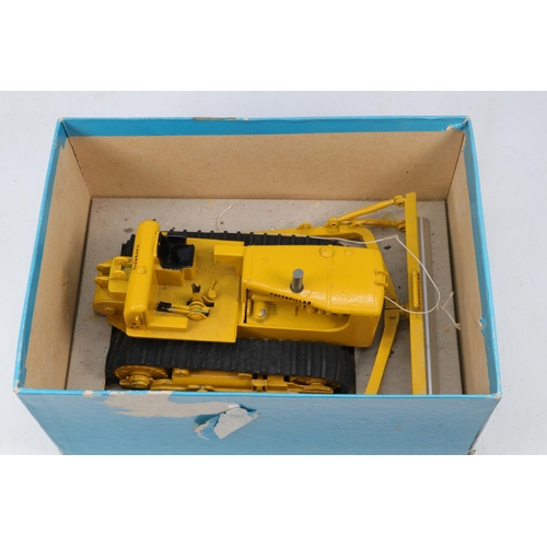 87A - Spot-on by Triang Caterpillar bulldozer with original box. Shows some signs of play ware. Needs atte... 