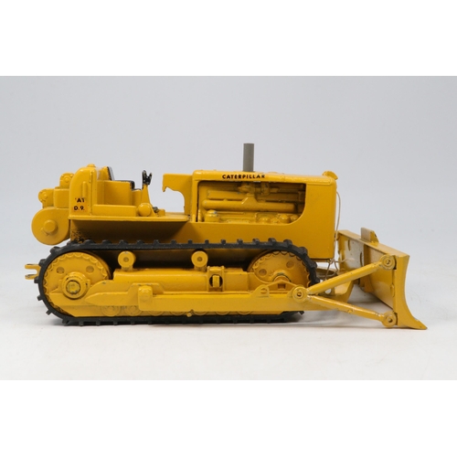 87A - Spot-on by Triang Caterpillar bulldozer with original box. Shows some signs of play ware. Needs atte... 