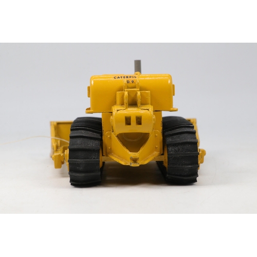 87A - Spot-on by Triang Caterpillar bulldozer with original box. Shows some signs of play ware. Needs atte... 