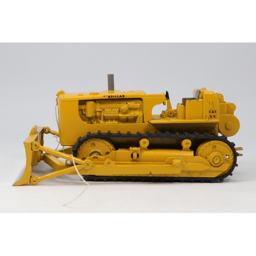 87A - Spot-on by Triang Caterpillar bulldozer with original box. Shows some signs of play ware. Needs atte... 