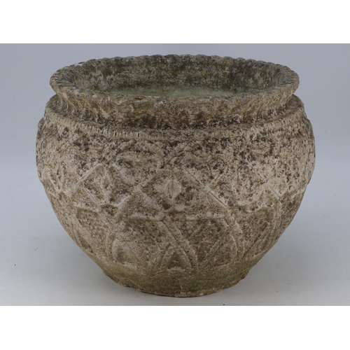 521 - A decorative stoneware garden pot, measures approx. 32cm wide by 28cm high