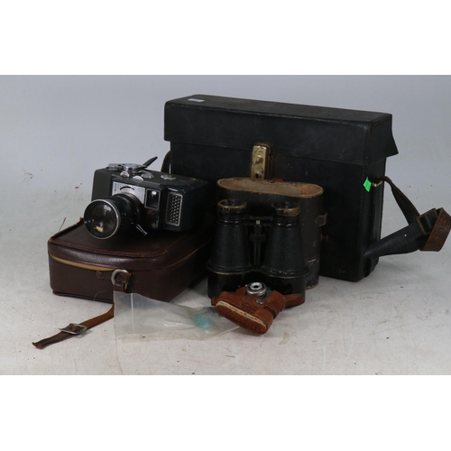 29 - Miniature Marvel camera in pig skin case together with a Bell and Howell optronic eye 8mm camera, a ... 