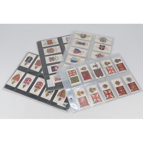 39 - A selection of cigarette cards to include John Player Regimental Standards and Cap Badges (50); Will... 