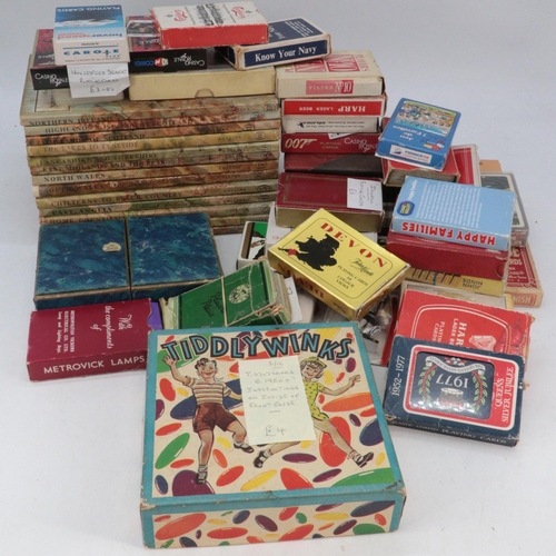 104 - A large quantity of assorted playing cards, small quantity of vintage board game and a quantity of a... 