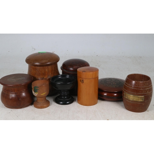 129 - Assorted small turned boxes together with other wooden items
