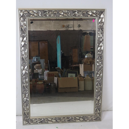 146 - Large decorative mirror measures approx. 76cm x 107cm