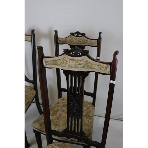 155 - Four upholstered dining chairs (upholstery does not comply to current fire regulations and it is the... 