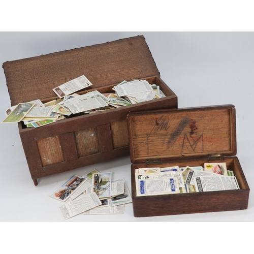 169 - Wills cigarette album to include various part sets, together with loose Brooke bond, and books some ... 