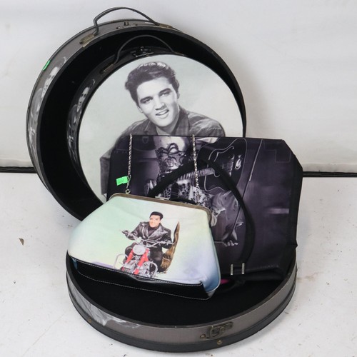92 - Elvis display suitcase set together with an apron and two bags