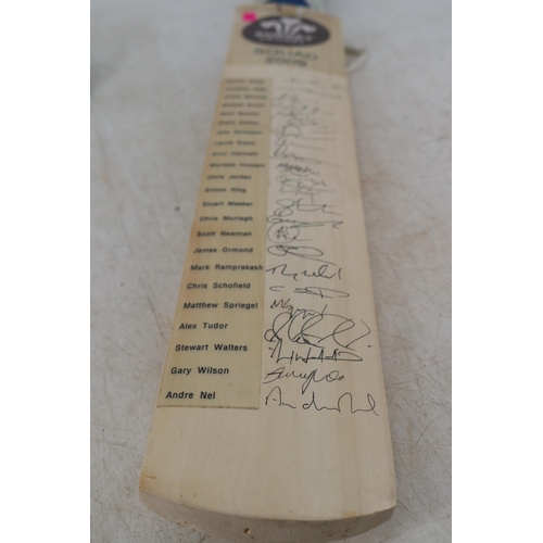 246 - Surrey cricket squad cricket bat from 2009 signed by the team to include Mark Ramprakash