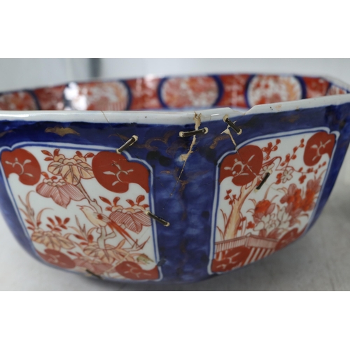 317 - Imari bowl with historic staple repairs together with a Carp plate, various vases and a Chinese ging... 