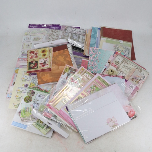 329 - Large quantity of crafting supplies to include crafting pattern, assorted craft dies etc paper