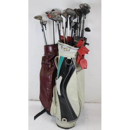 285 - Three golf bags of assorted golf clubs to include Taylor made, Wilson