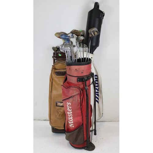 468 - Three golf bags of assorted golf clubs with a clikka bag