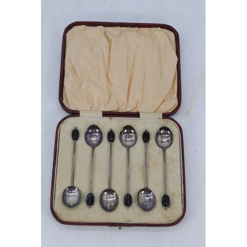 10 - A cased set of silver hallmarked coffee bean spoons