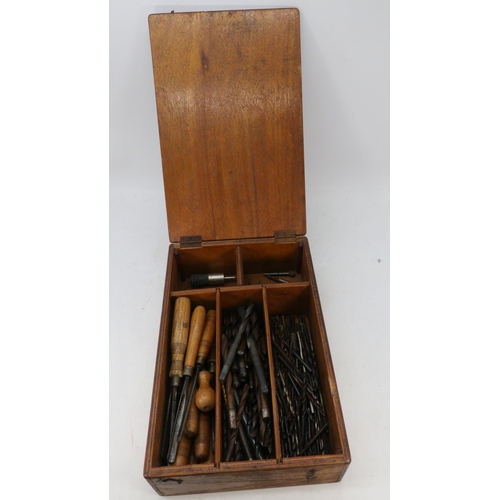 268 - A quantity of chisels and drill bits in a wooden box