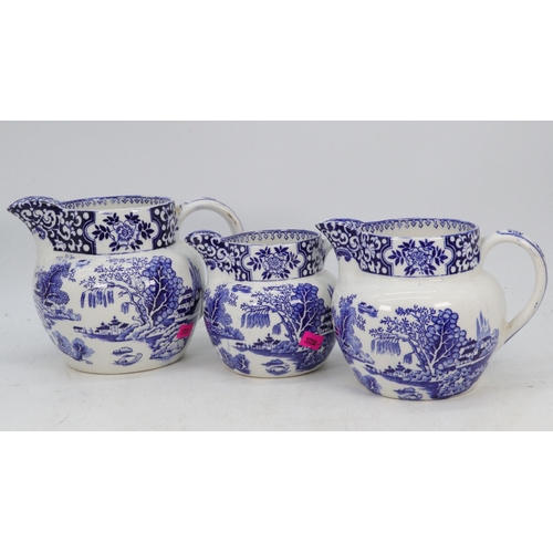 336 - Graduated set of three “Ming” pattern ceramic jugs