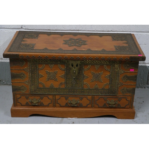 398 - Omani Dowery chest with overlaid brass studs, measures approx. 79cm w x 38cm d x 44cm h