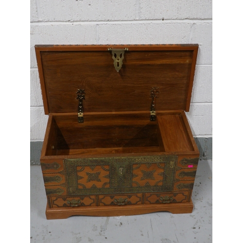 398 - Omani Dowery chest with overlaid brass studs, measures approx. 79cm w x 38cm d x 44cm h