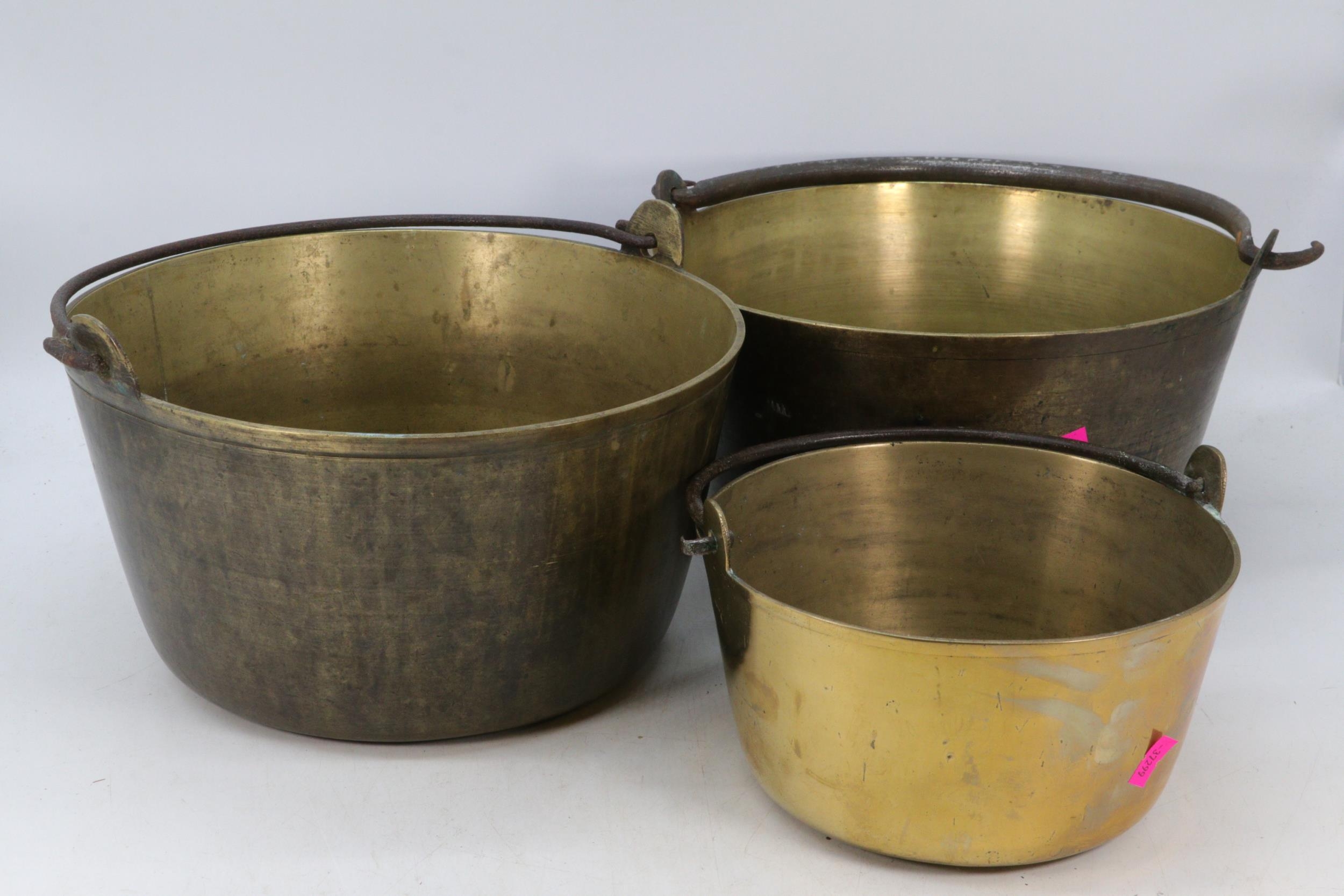 Three brass jam pans