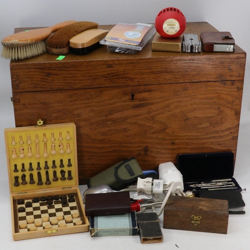 503 - An oak small storage box together with sundries, including brushes, multitool, precision drawing set... 