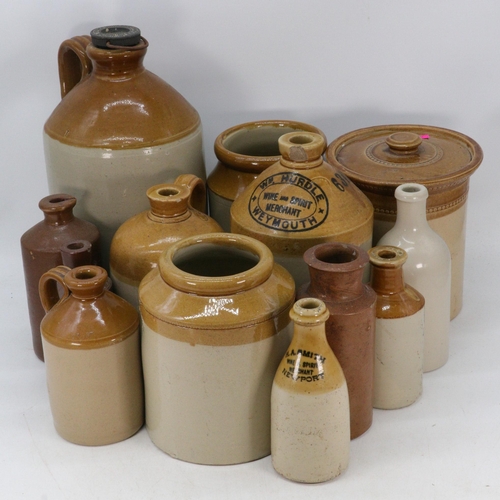 520 - Selection of vintage and later stoneware bottles, flagons, storage jars and more.