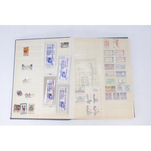 United States stock book assorted stamps together with 1972 74