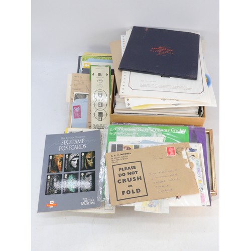 510 - A large box of assorted first day covers, some mint stamps etc