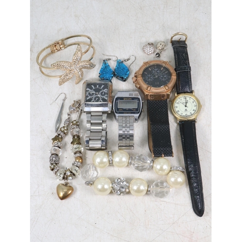 9 - A quantity of costume jewellery including watches