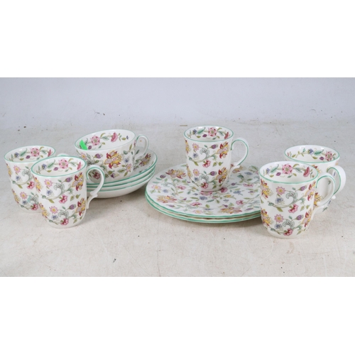 34 - A selection of Minton Haddon Hall porcelain to include 2x plates 8'', 1 teacup, 3 saucers and 5 coff... 