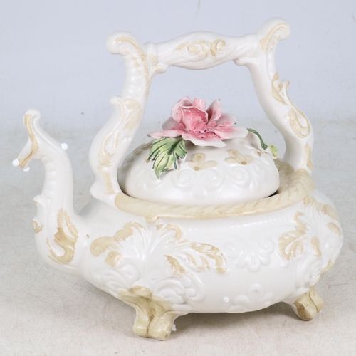 65 - A Capodimonte floral teapot.