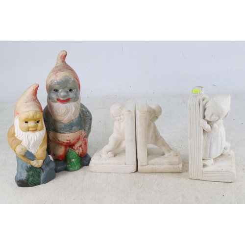 78 - A pair of early London plaster bookends with one other and two vintage gnomes.