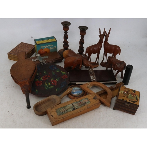 122 - A carton of wooden items; animals, barley-twist candlesticks etc..