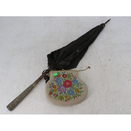 145 - A white metal handled parasol with inscription together with a vintage beaded purse (A?F)