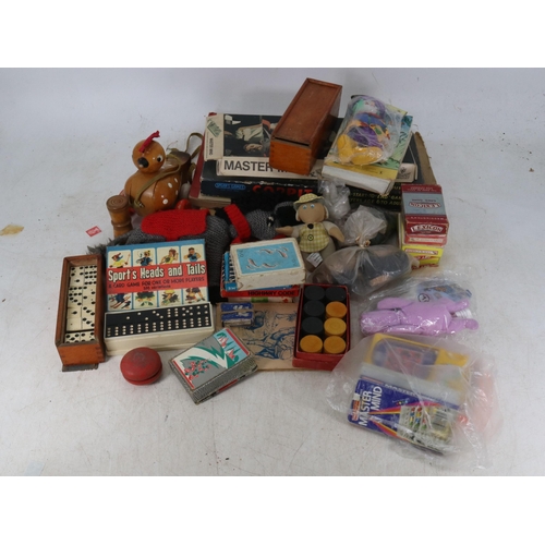 209 - A collection of vintage toys and games