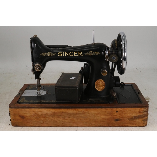 210 - An early electric sewing machine. Trade - spares or repairs.