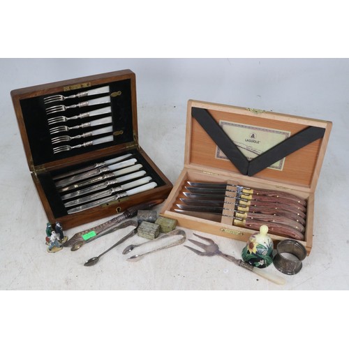 71 - Two cases of cutlery; vintage knife and fork set and a set of steak knives by Laguiole, and an assor... 