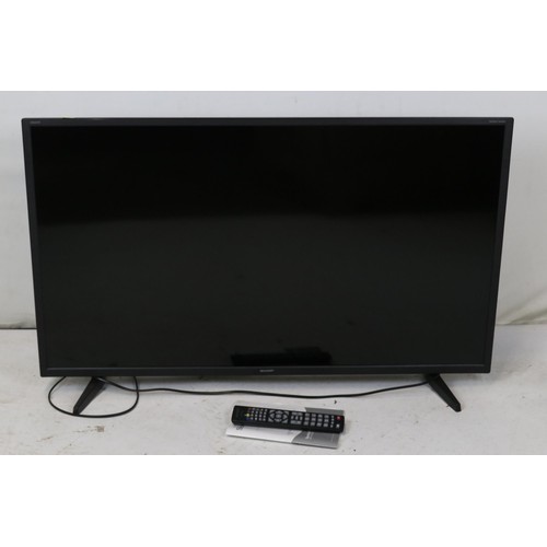 166 - A Sharp LCD TV with remote. Model number LC-40F13421K. TRADE/SPARES/REPAIRS