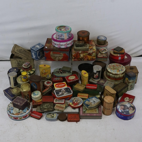 252 - A large collection of vintage tins.