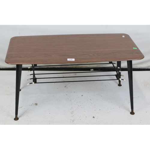 170 - A mid-century coffee table with wire rack under. Measuring approx. 77w x 38d x 40cmh