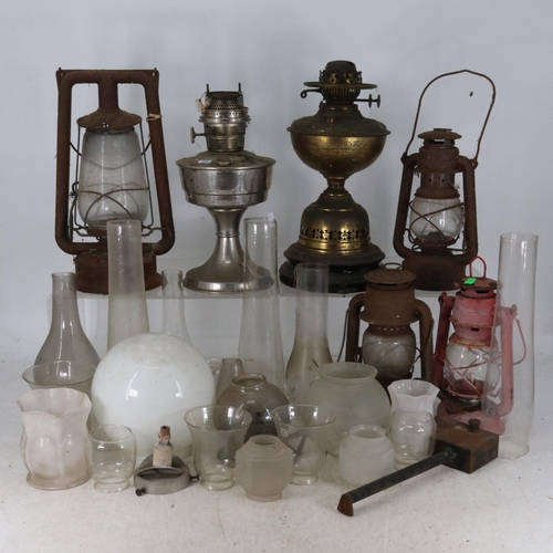 278 - A quantity of hurricane lamps, various shades, flues etc..