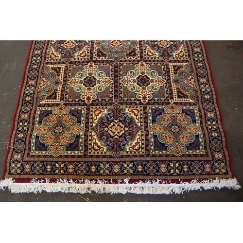 19A - Persian style rug approx.  6ft by 10ft