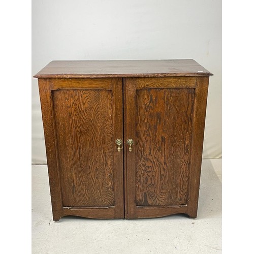 156 - Low vintage oak cabinet fitted three shelves for shoes inside. approx. 76cm w 36cm deep x 77cm t