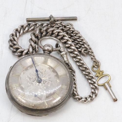 13 - An antique silver pocket watch and chain