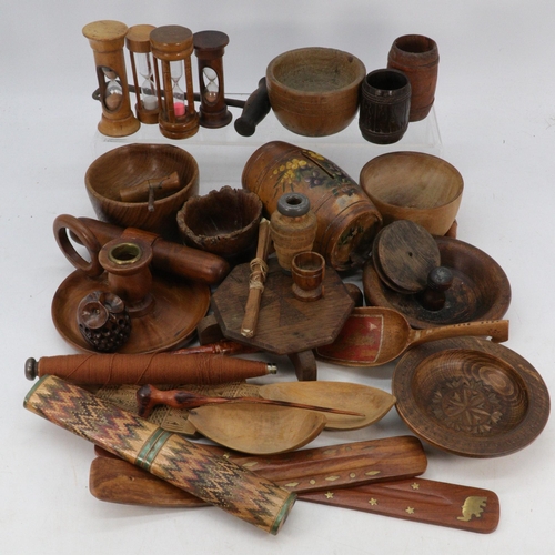 45 - A quantity of carved wooden items, barrel, bowls, etc